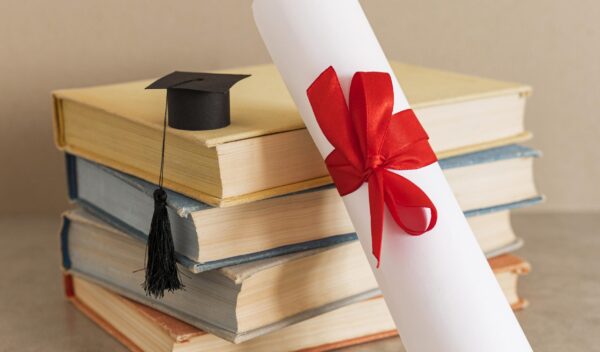 education-diploma-certificate-with-red-ribbon-bow[1]